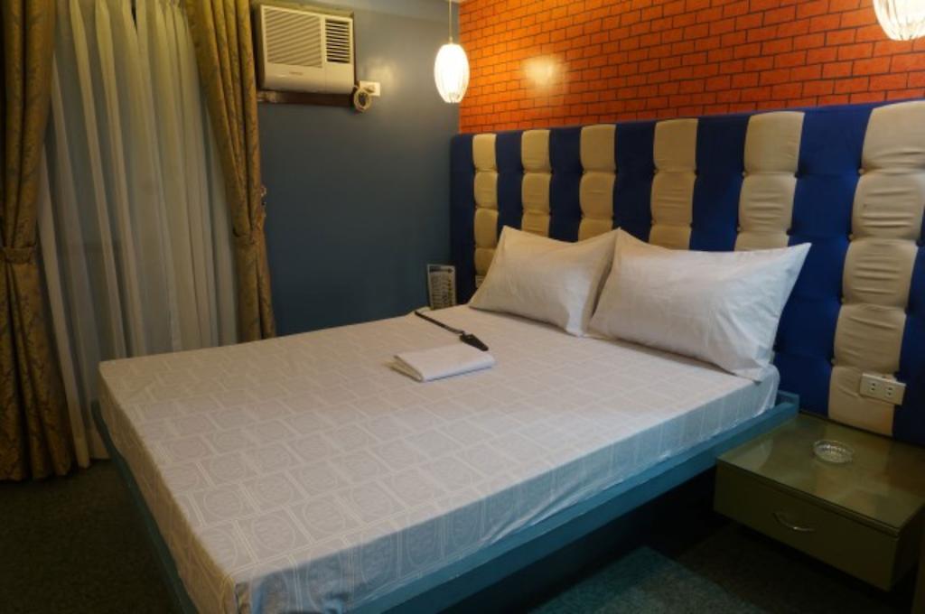 Icon Hotel Macapagal Manila Quarto foto