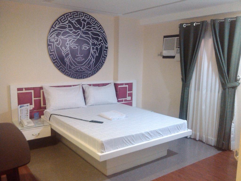 Icon Hotel Macapagal Manila Quarto foto